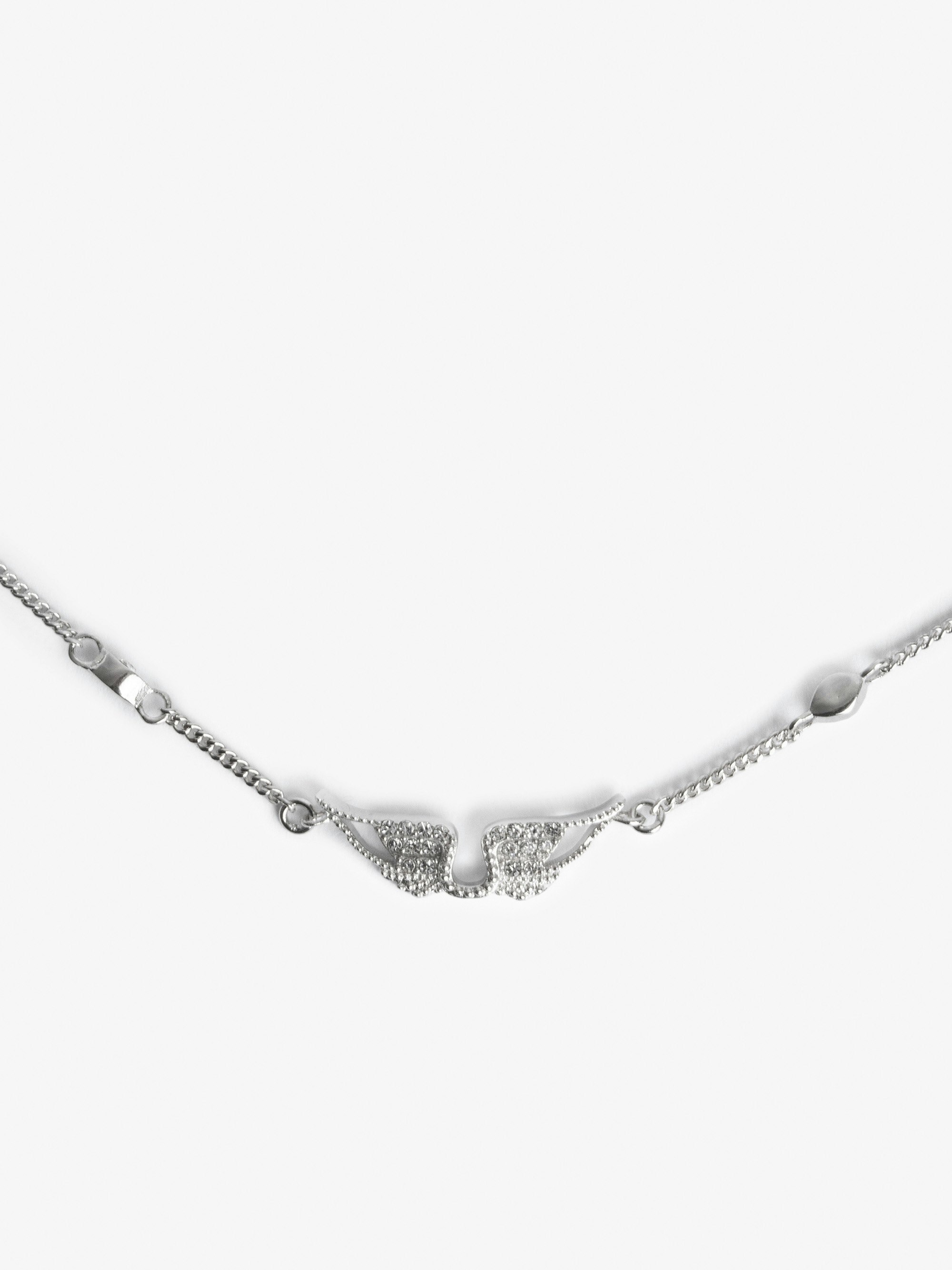 Rock Necklace - Necklace with chain and wing pendant adorned with crystals.